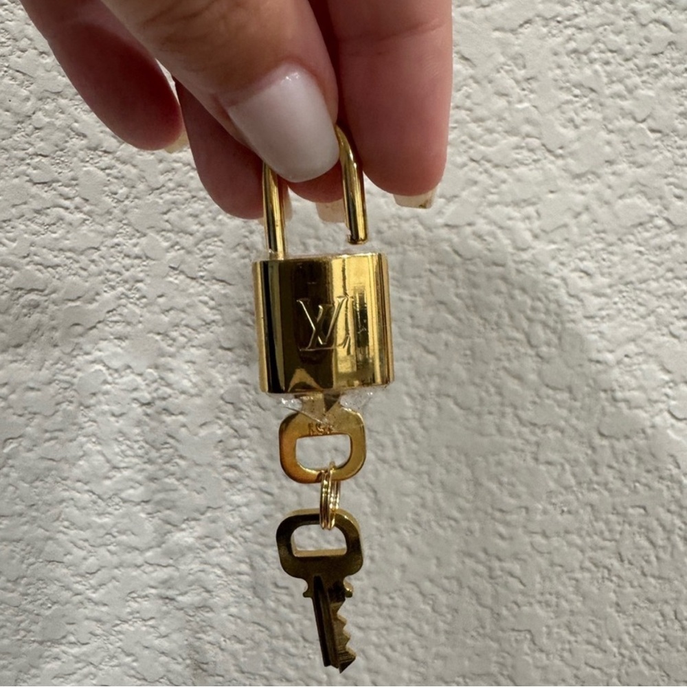Louis Vuitton Gold Lock W/ Keys